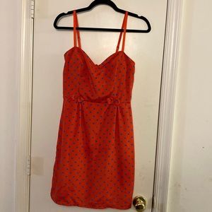 Red dress with blue polka dots
